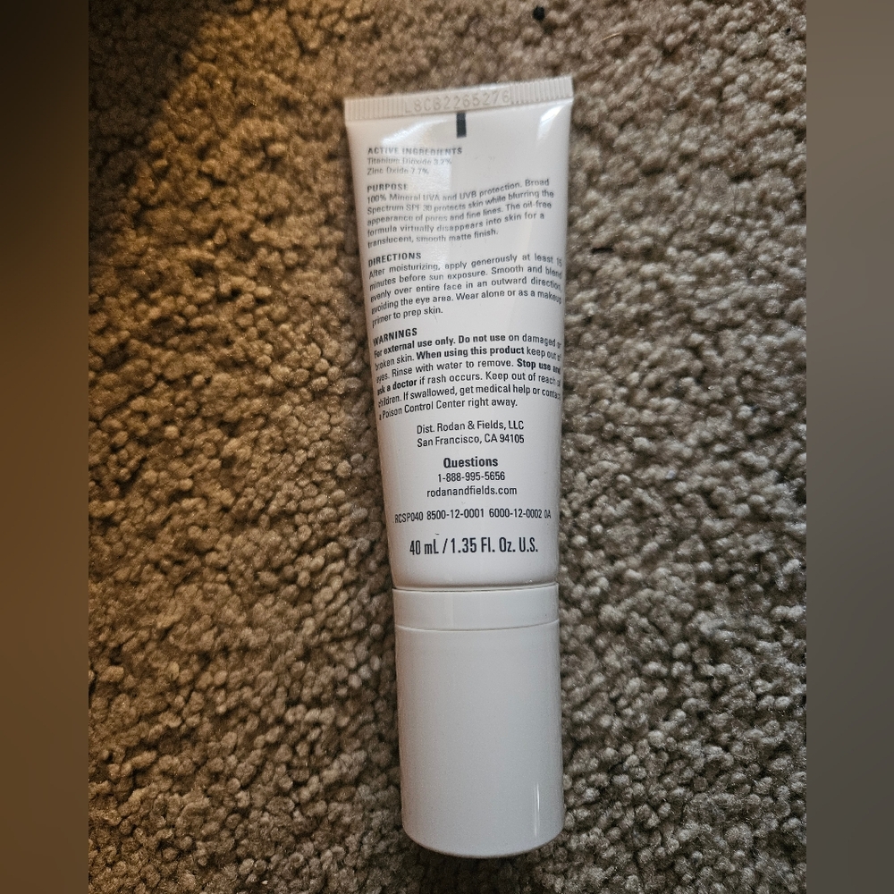 Rodan + Fields Recharge SPF 30 Sunscreen - White and Teal - Picture 2 of 3